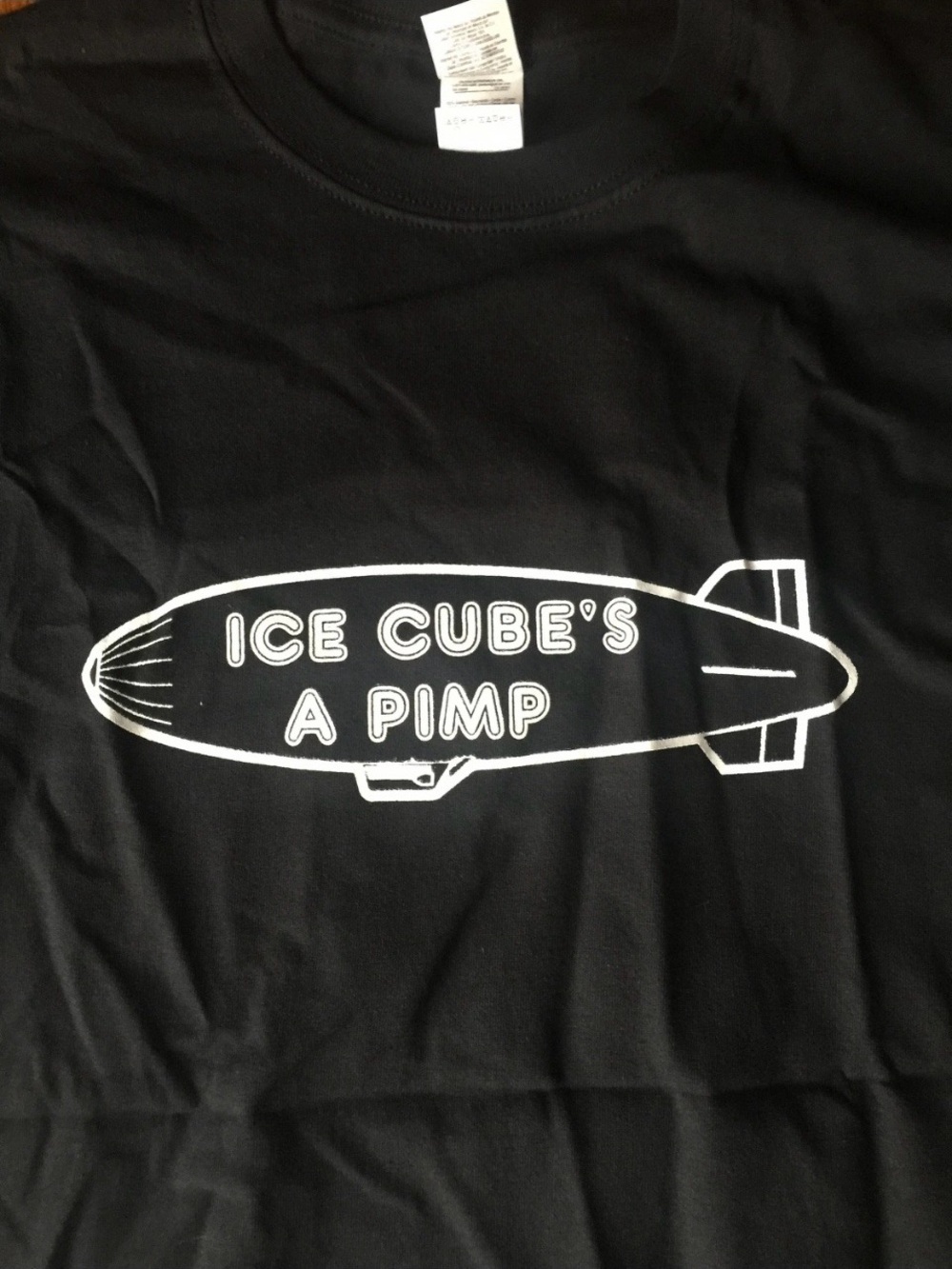 Black Graphic Tee with White 'ICE CUBE'S A PIMP' Airship Print